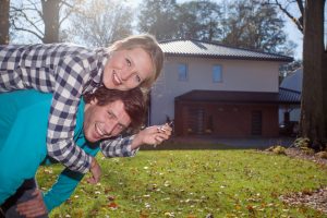 Happy couple with new home