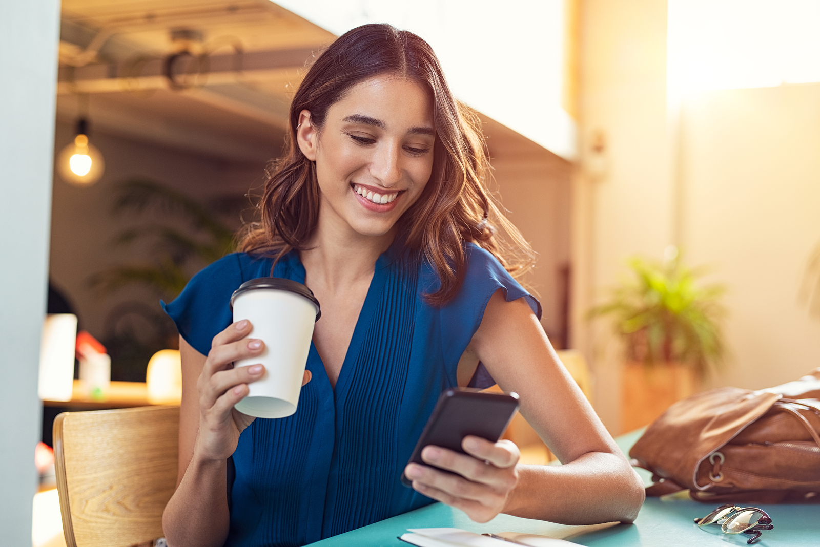 what is overdraft protection woman smiling at phone