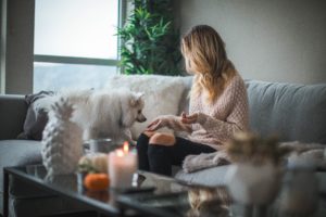 first mortgage woman in new home with dog