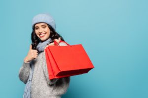 woman shopping in winter hat