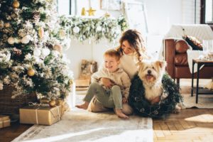 holiday season family smiling at decorated - no fraud