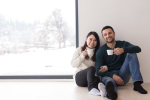 couple drinking hot cocoa with heat loan
