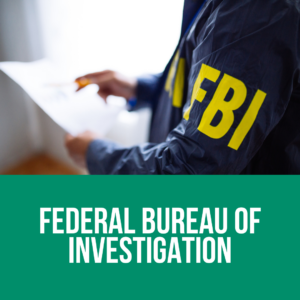 Person in an FBI jacket with the text on a banner at the bottom reading Federal Bureau of Investigation