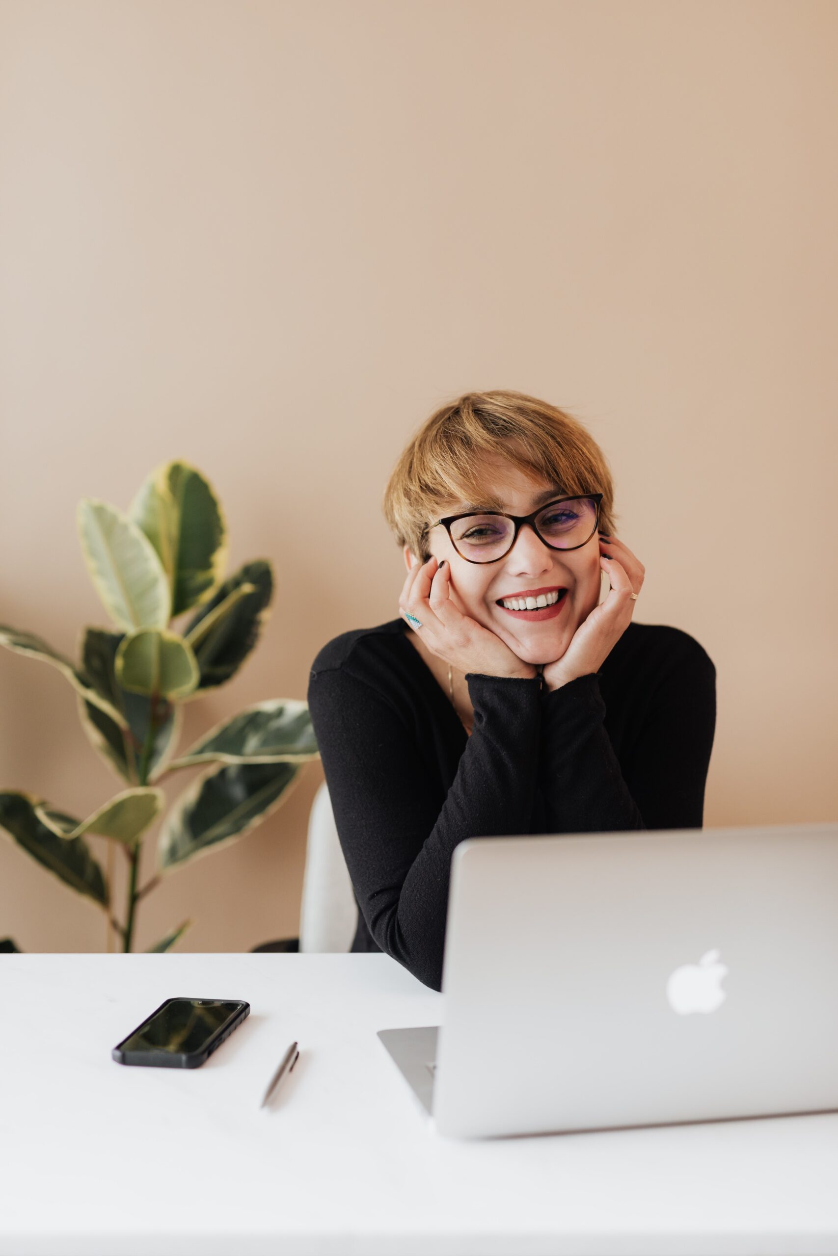 women smiling on computer learning about browser cookies