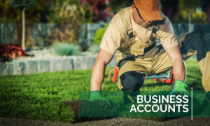 Man rolling out turf with text "Business Accounts"