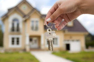 holding keys Mortgage Wire Fraud